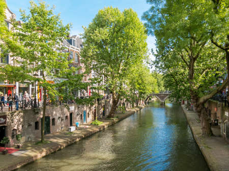 UTRECHT, NETHERLANDS - MAY 21, 2015: Quays and wharf cellars on Oudegracht Tolsteegzijde with Hamburger Bridge in the city of Utrecht, Netherlandsのeditorial素材