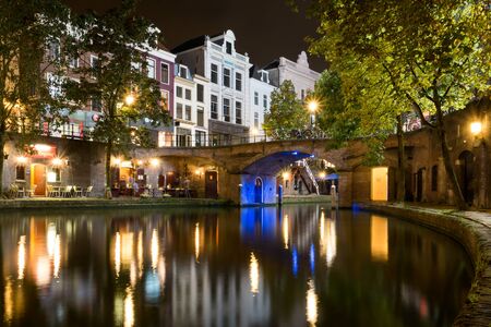Wharf level night view of Oudegracht canal in the old city centre of Utrecht, Netherlandsの写真素材