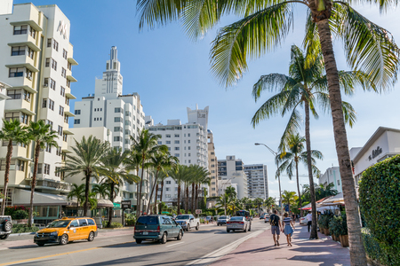 People and traffic on Collins Avenue in South Beach district of Miami Beach, Florida, USAのeditorial素材