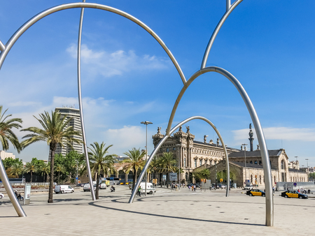 Maritime Museum and skyscraper Edificio Colon with modern street art on Plaza Drassanes in Barcelona, Catalonia, Spainのeditorial素材