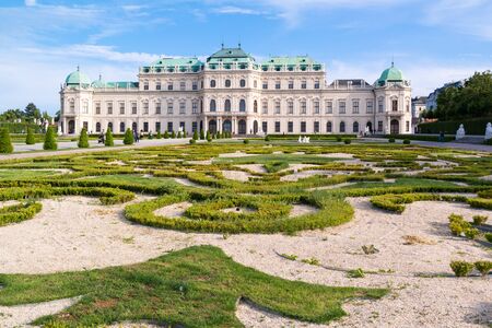 Belvedere gardens with people and Upper Belvedere Palace in Vienna, Austriaのeditorial素材