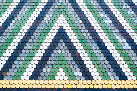 Mosaic of colourful tiles on roof of Stephansdom, St. Stephen's Cathedral in city centre of Vienna, Austriaの写真素材
