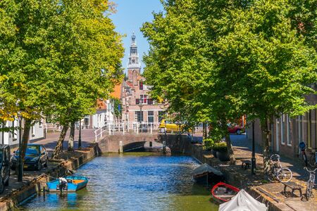 Baangracht canal with trees and boats in Alkmaar, North Holland, Netherlandsのeditorial素材