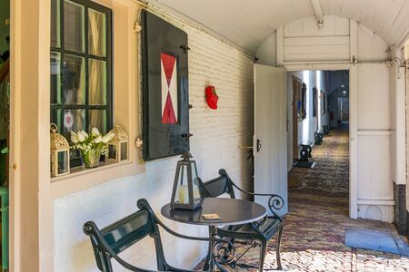 Covered passage to courtyard of Hofje van Splinter almshouses in Alkmaar, North Holland, Netherlandsのeditorial素材