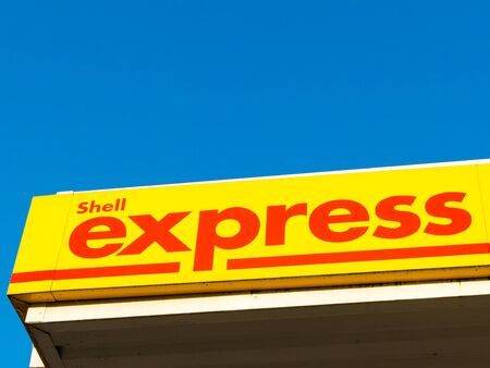Shell express trademark of petrol station of Royal Dutch Shell multinational oil and gas company, Netherlandsのeditorial素材
