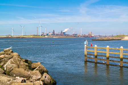 North Sea Canal and steel industry plant in seaport IJmuiden near Amsterdam, Netherlandsのeditorial素材