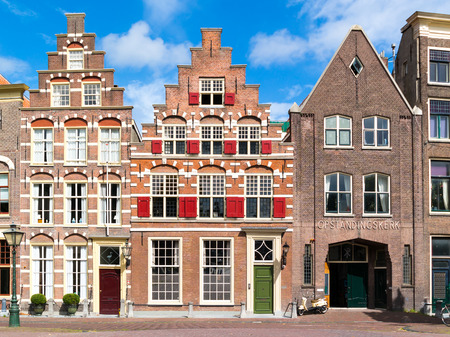 Row of historic gables on Steenschuur canal in old town of Leiden, South Holland, Netherlandsのeditorial素材