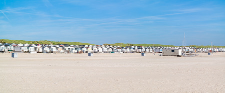 Row of beach houses or huts on IJmuiden beach at North Sea coast in Netherlandsのeditorial素材
