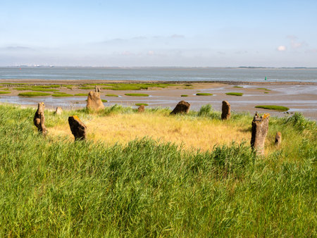Circle of stones on Westerschelde river dyke in Terneuzen, Zeeuws-Vlaanderen, Zeeland, Netherlandsの写真素材