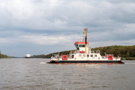 Ferry boat Stettin crossing Kiel Canal to Kudensee, Schleswig-Holstein, Germanyのeditorial素材