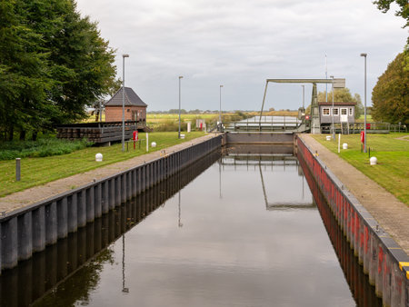 Gieselau canal lock and bascule bridge from Kiel Canal to Eider, Schleswig-Holstein, Germanyの写真素材