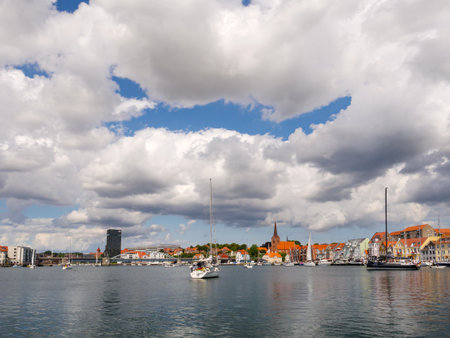 Sailing boats waiting to pass King Christian X Bridge over Alssund in Soenderborg, Southern Denmarkの写真素材