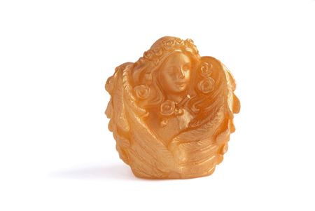 Gilded christmas candle as an angel         の写真素材