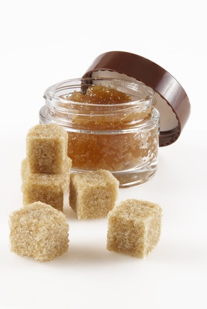 Body scrub with brown sugar crystals                        の写真素材
