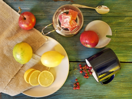 Freshly sliced, lemon on a platter, wooden tableの写真素材