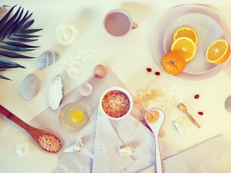 Sea salt, sliced orange, ingredients for a mask, scrubの写真素材