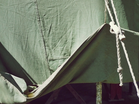 green tent, tarpaulin texture, outdoor recreation conceptの写真素材
