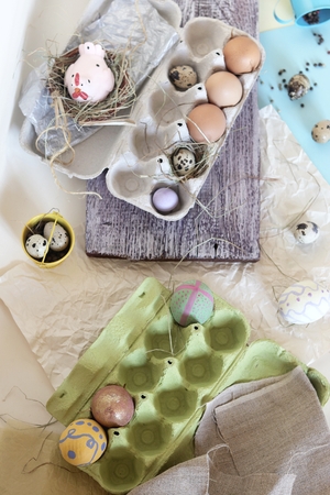 toy chicken, eggs, easter decor on a light backgroundの写真素材