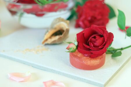 Natural soap, sea salt, buds, petals, roses, shells on the table, spa proceduresの写真素材