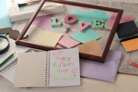 Father's Day, a composition of three-dimensional letters, frames, funny mustaches, magnifying...