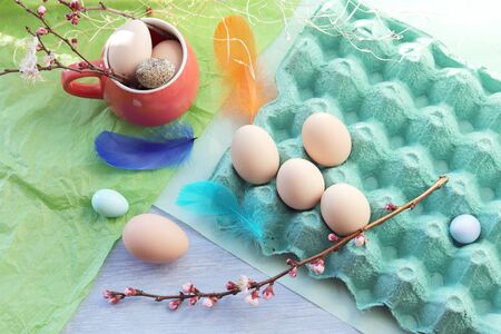 Happy Easter, eggs, decor, flowering branches of a cherry on the background of the window, spring,...