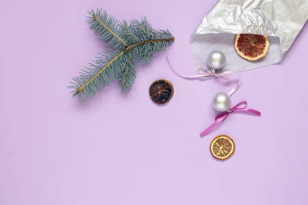 Merry Christmas, light textural background with Christmas decor, spruce branches and space for an inscription, top viewの写真素材