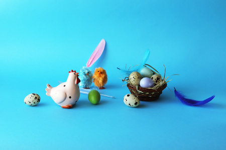 Easter eggs, chicken and decorations on a bright background, congratulations, postcardの写真素材