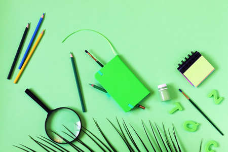 Stationery, pencils, notepads on bright background, top view, learning concept, back to schoolの写真素材