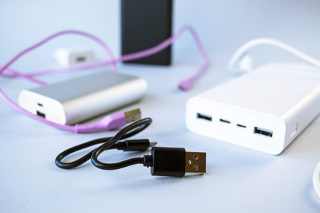 Power bank with usb flash drive on white background, close-upの写真素材