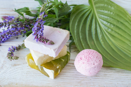 Handmade soap with lavender and sea salt on a wooden background