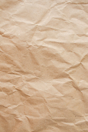 Brown crumpled paper background. Close up of crumpled paper texture.の写真素材