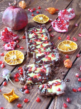 chocolate tart with lemon curd and pomegranateの写真素材