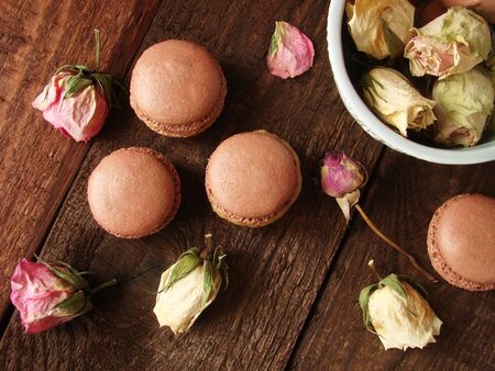 chocolate macaroons with lemon curd and candied fruitの写真素材