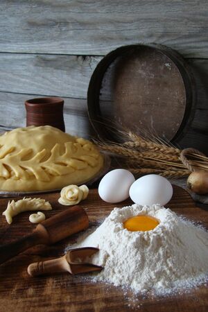 Still life of ingredients for the dough and the butter cake.