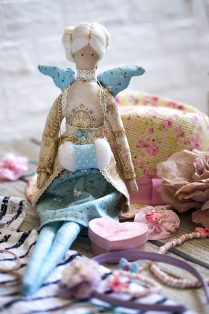 Summer attributes, decorations, Swedes and hat for little girl and doll in the style of the Tildeの写真素材