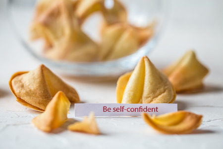 Fortune Cookies  with blank paper, in the backgroundの写真素材