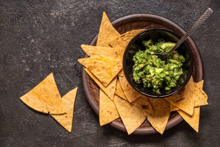 Mexican food guacamole avocado with tortilla, nachosの写真素材