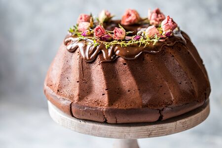 chocolate cupcake stuffed with cream cheese, thyme and rosesの写真素材