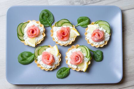 Tartlet with cream cheese, cucumber and slightly salted troutの写真素材