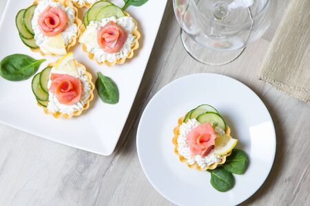 Tartlet with cream cheese, cucumber and slightly salted troutの写真素材