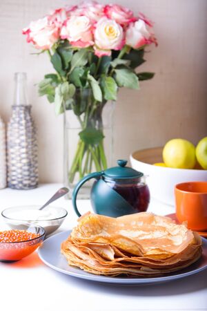 Traditional Russian pancakes with caviar and sour cream. Shrovetide. Selective focusの写真素材