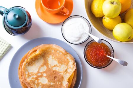 Traditional Russian pancakes with caviar and sour cream. Shrovetide. Selective focusの写真素材