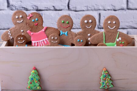 Gingerbread men and figures. Traditional New Year and Christmas homemade cookies. Christmas background. Selective focus, close up.の写真素材