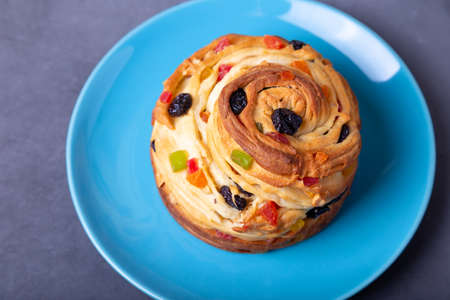 Craffin (Cruffin) with raisins, nuts and candied fruits. Easter Bread Kulich. Easter Holiday....
