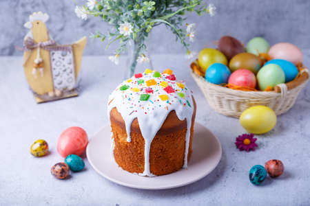 Easter cake with candied fruits and colored eggs. Traditional Easter baking. Easter holiday....