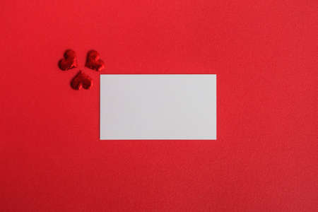 Three hearts, blank Valentine's Day greeting card. Red monochrome romantic background. Bannerの写真素材