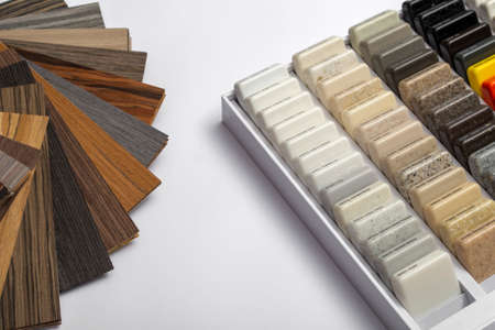 Samples of natural granite, marble, quartz stone, countertops and a sample of natural parquet. Model...