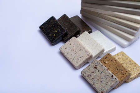 Samples of natural granite, marble, quartz stone, countertops and a sample of natural parquet. Model...