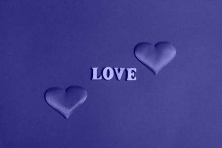 Composition for Valentine's Day. On a very peri  background, red hearts close up with copy spaceの写真素材