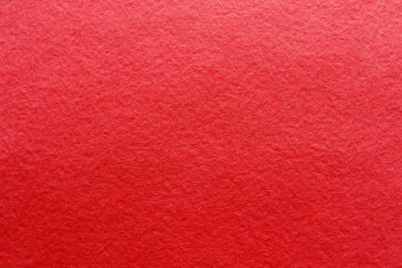 Soft red felt fabric. Felt texture for background. Christmas backgroundの写真素材
